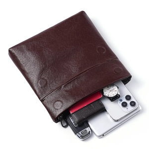 Sacoche luxe en cuir tanné végétal marron foncé avec plusieurs compartiments de rangement