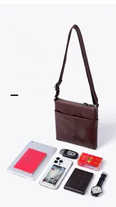 Deep brown leather messenger bag showing capacity for iPad, phone, and daily essentials