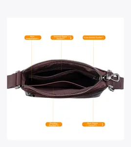 Detail view of the brown leather shoulder bag interior compartments and pocket layout