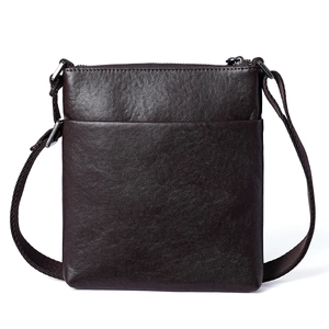 Deep brown leather crossbody bag for men with adjustable strap and front pocket detail