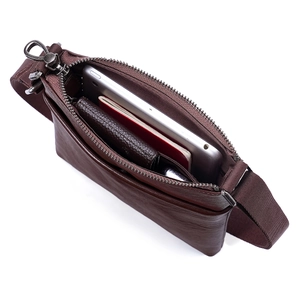 Brown leather crossbody bag with multiple zippers and storage for iPad mini and wallet