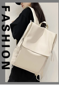 Side view of cream white casual backpack on model featuring flap and zipper closure