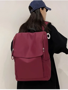 Fashionable burgundy waterproof backpack with large flap for college students and travel