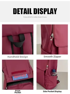 Detail of red travel backpack with top handle, smooth zippers, and mesh side pockets