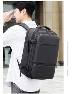 Detail of waterproof matte black business backpack with multi-compartment zipper design