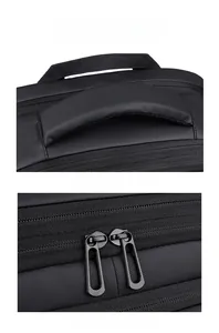 Detail of high-density fabric with first layer cowhide handle and smooth metal zippers