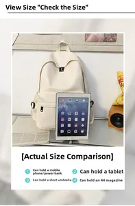 Detail view of large capacity cream backpack showing size comparison with a tablet