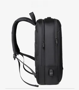 Detail view of modern business backpack side profile with integrated USB charging port