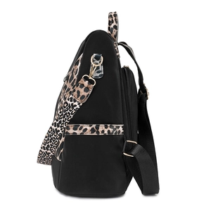 Sac à dos tendance imprimé léopard pour femme avec boucles dorées et poches côté