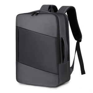 Sleek business laptop backpack in dark gray water-resistant fabric for commuting
