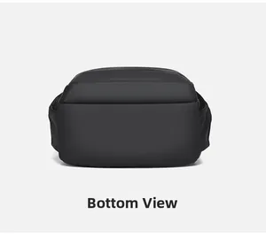 Detailed bottom view of the black travel backpack showing water-resistant nylon material
