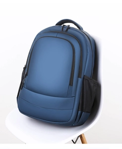 Detail of dark blue waterproof backpack with breathable mesh side pocket on chair