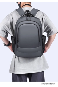 Deep gray business laptop backpack with multiple zipper compartments and mesh side pockets
