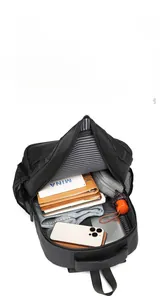 Interior view of large capacity black backpack showing multiple organized compartments