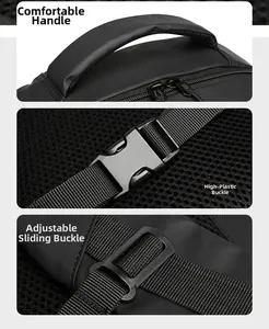 Detail of padded handle and high-strength plastic buckles on black waterproof backpack