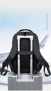 Detail of the luggage strap on the back of a black business laptop backpack