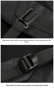 Detail of adjustable chest slide buckle and breathable mesh straps on the black backpack