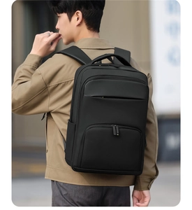 Waterproof black business backpack with ergonomic padded shoulder straps for commuters