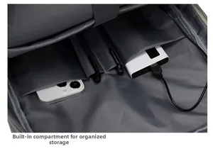 Detail of internal compartments for organized storage in business backpack