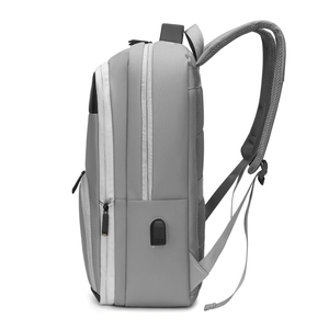 Grey waterproof business backpack with USB port and ergonomic mesh straps for travel