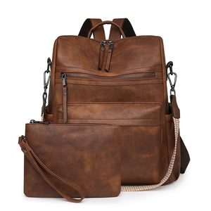 Conjunto de mochila retro de cuero marrón de gran capacidad con cartera a juego