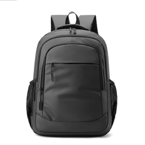 Front view of black waterproof business backpack with laptop compartment and mesh pockets