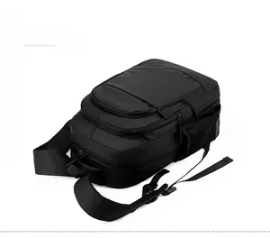 Front view of a large black business laptop backpack with multiple zipper compartments