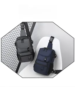 Detail of waterproof functional chest bags in grey and navy blue with adjustable straps