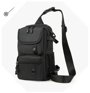 Side view detail of water-resistant black nylon tactical chest bag with buckles