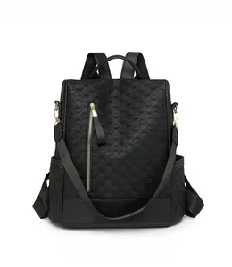 Close-up of black anti-theft backpack featuring premium 3D woven texture and zipper detail