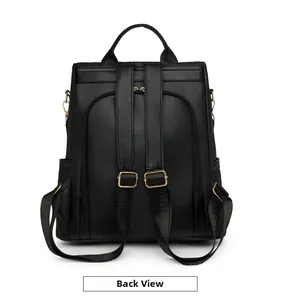 Detail of the anti-theft back pocket and adjustable straps on black leather backpack
