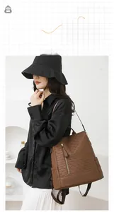Brown faux leather anti-theft backpack for women with quilted texture detail