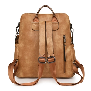 Mochila vintage de cuero sintético marrón con correas anchas y bolsillo oculto trasero