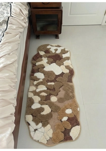 Detailed texture of thick tufted Nordic moss carpet with beige and brown abstract patterns