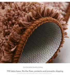 Detail of high-density flocked rug showing thick brown fibers and TPR non-slip backing