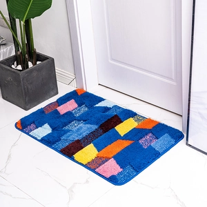 Boheems geometrisch kleurrijk geflokt tapijt met antisliptextuur in slaapkamer