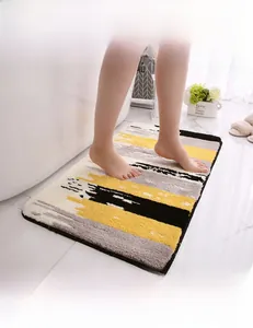 Detailed view of soft thickened striped bath mat with non-slip high-density plush texture