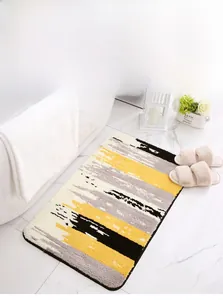 Detailed texture of thick flocked rectangular rug with abstract yellow and grey strokes