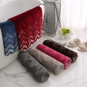 Absorbent non-slip bathroom mat with geometric wave pattern in various colors