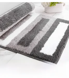 Close-up of thick striped microfiber bathroom rug with high water absorption