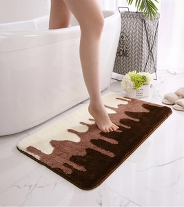 Close-up of the thick absorbent bathroom mat with soft wavy texture and non-slip backing