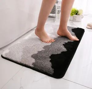 Close-up of soft plush bath mat with grey zigzag pattern and anti-slip texture