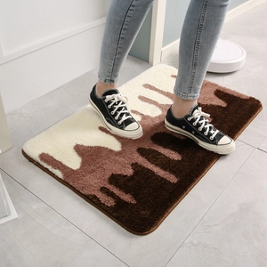 Thick plush bath mat with brown wave pattern, non-slip absorbent rug for home bedroom entrance