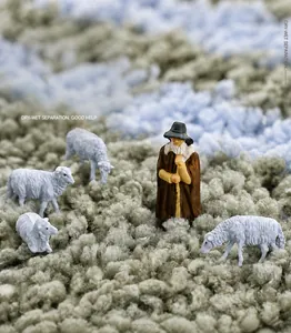 Détail macro de tapis en fibres denses avec figurines de berger et de moutons