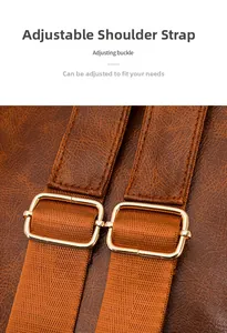 Detail of adjustable nylon shoulder strap with golden metal buckles on brown retro backpack