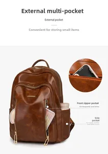 Detailed view of the brown retro leather backpack featuring golden metal zippers and side pockets