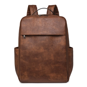 Front view of a dark brown vintage PU leather backpack with side pockets and front zipper