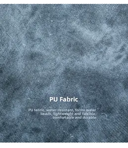 Detail of blue PU leather showing twill texture and waterproof functional features