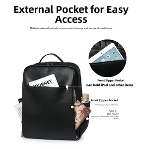 Detail view of black PU leather backpack showing organized multi-pocket interior storage