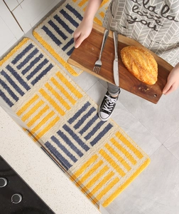 Macro view of textured geometric striped kitchen mats with soft plush fiber detail